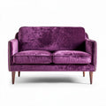 Purple velvet two-seater sofa with wooden legs measuring 150 x 75 x 85cm
